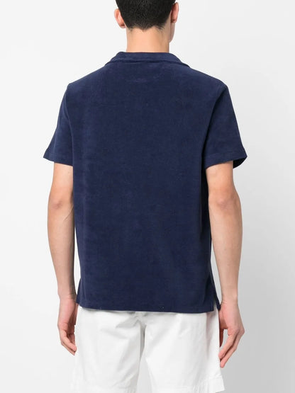 camisa polo com bolso de remendo de logotipo